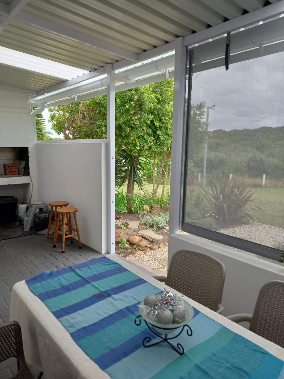 Interior shutters and screening fitted in a Jeffreys Bay home by 4 Seasons Awnings & Blinds